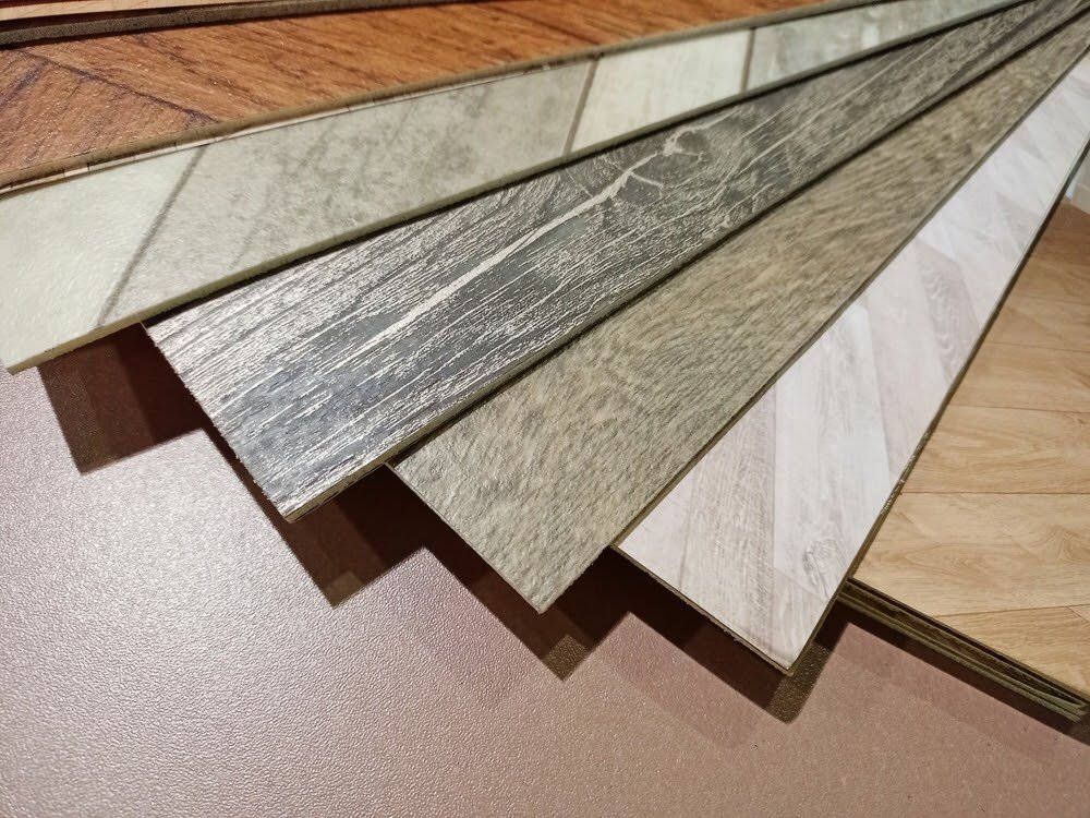 Samples of different types of flooring, displaying various colors, textures, and materials.